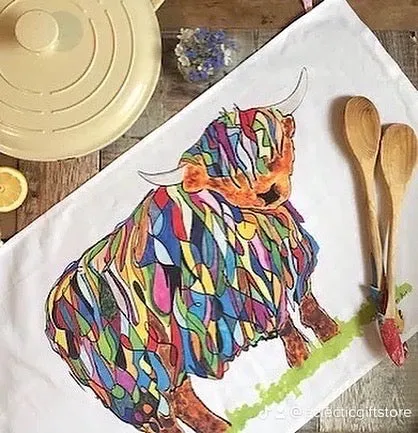 BRIGHT HIGHLAND COW TEA TOWEL ON WHITE